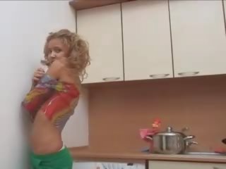 Watch this pussy having fun in the kitchen