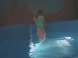 Thin lassie mastrubating in pool